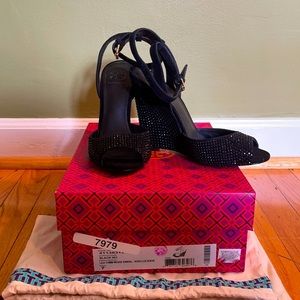 Tory Burch black wedge sandal.